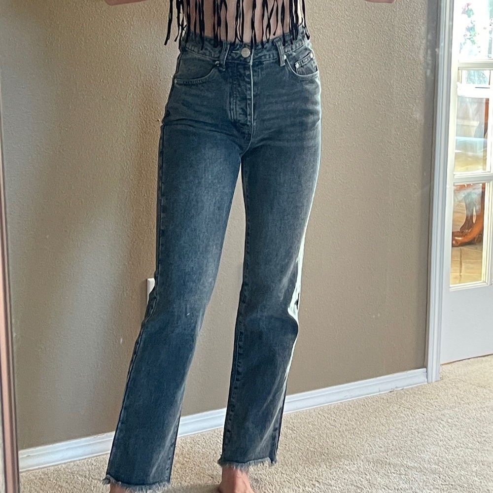 Slightly dark washed blue jeans